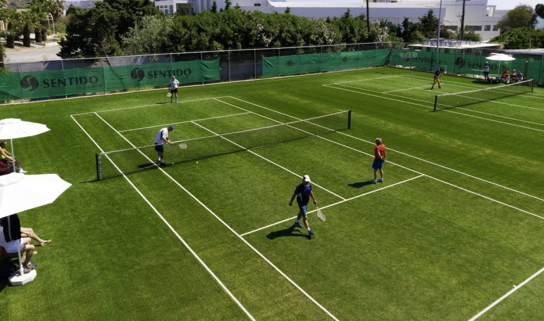 A tennis court inside Apollo Blue 5 star hotel in Rhodes awaits tennis lovers