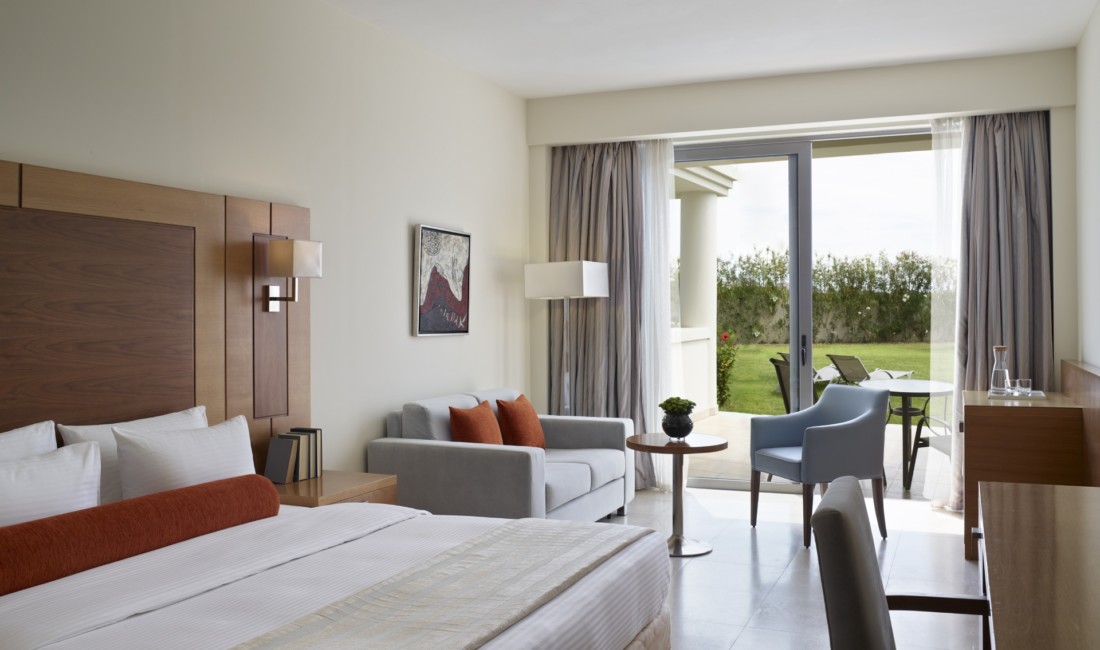 A double room with garden view offers luxury accommodation in Rhodes