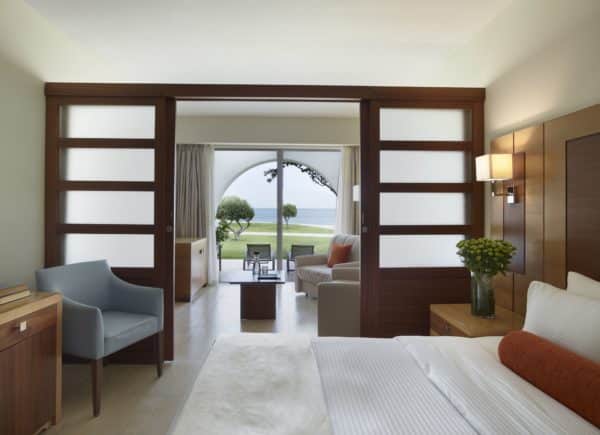 Interior view of the double room with pool view in Rhodes at Apollo Blue Hotel.