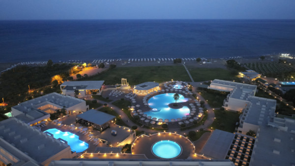 Evening aerial shot of Apollo Blue Hotel showing pools, facilities and beach