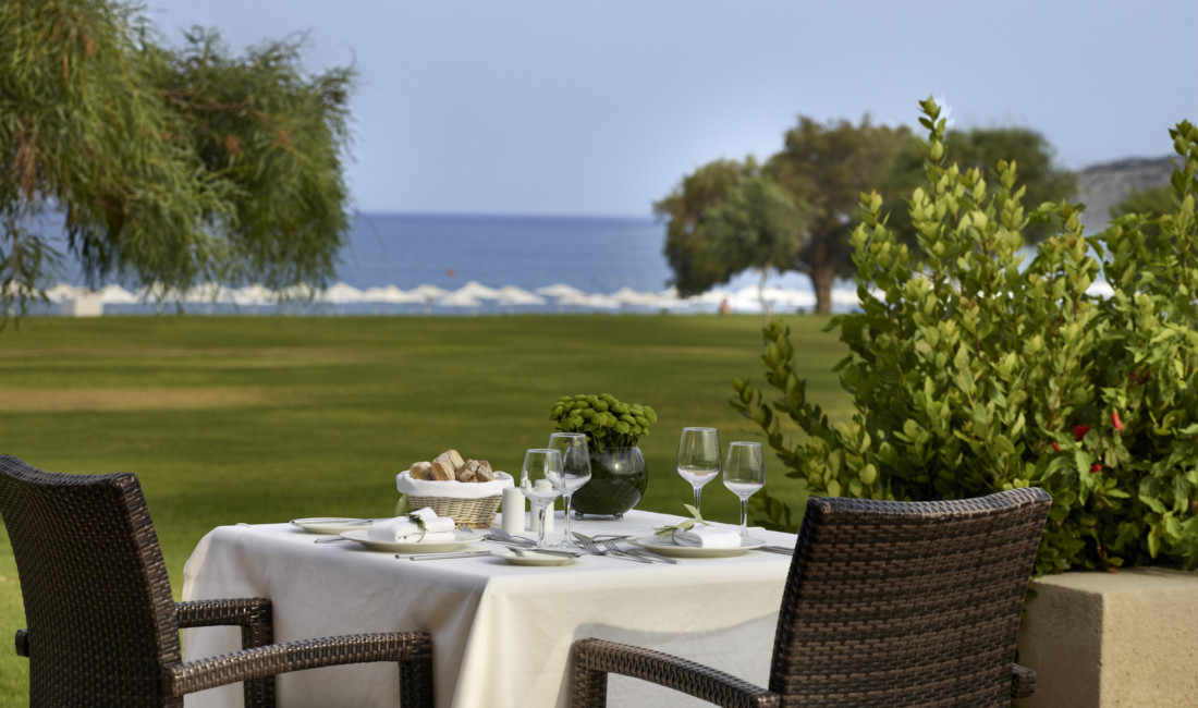 Table set ready to host a flavoursome lunch while gazing at the sea at Apollo Blue Hotel
